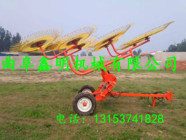 供應(yīng)拖拉機(jī)帶牽引式摟草機(jī)型號(hào) 鑫明全自動(dòng)八盤摟草機(jī)最新報(bào)價(jià)