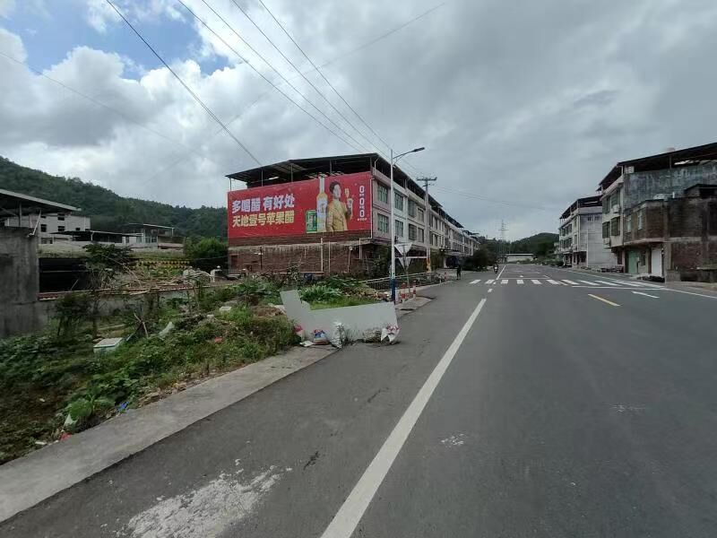 常德石門墻體廣告人車流量大的主道壯志凌云湖南新寧鄉(xiāng)村掛布廣告葡萄美酒夜光杯，